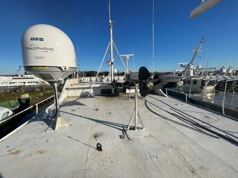 Satellite communications dome mounted above deck